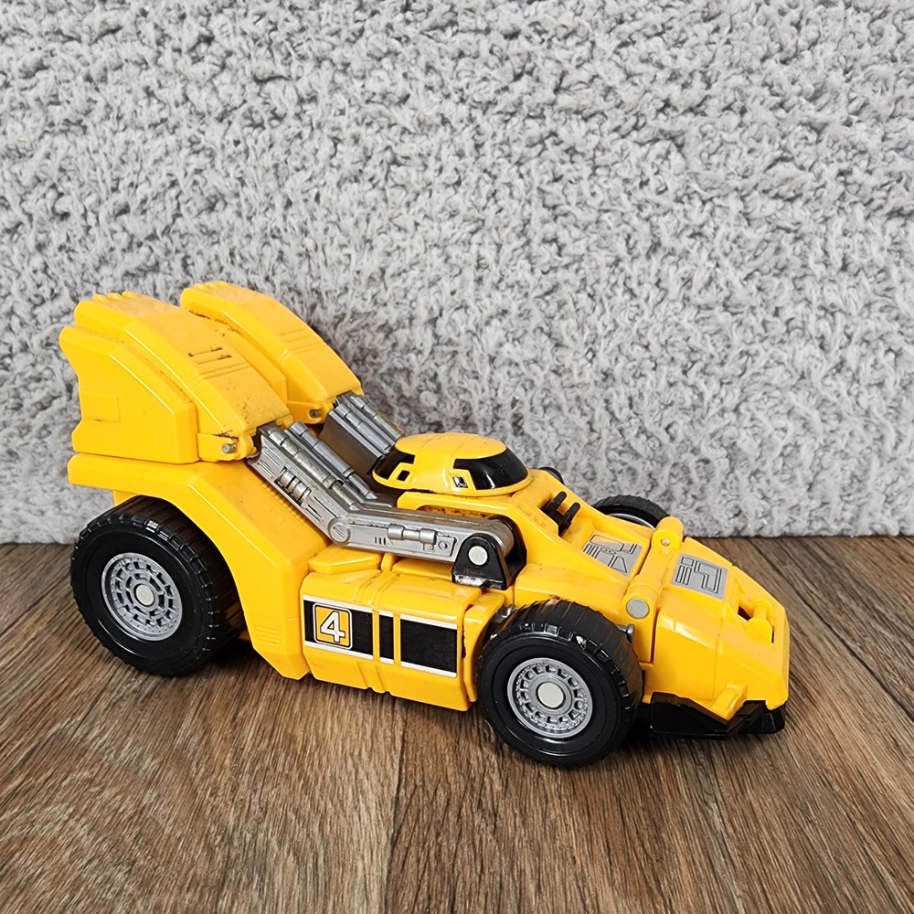Vintage 1980s Bandai Transforming Robot Yellow Race Car #4 Action Figure 6" Toy